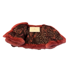 Load image into Gallery viewer, A raspberry  red mink bolero jacket with colourful lining and fur hook fastening at the front on a white background.