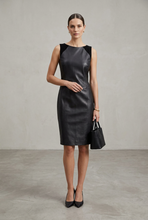 Load image into Gallery viewer, A black leather sleeveless dress displayed on a black mannequin against a light gray studio background.