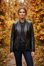 Load image into Gallery viewer, Vilniaus Kailiai Mod. 09771xxx jacket in black, featuring a stylish design with a high collar and zipper closure.