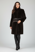 Įkelti nuotrauką į galerijos peržiūros programą, A woman modeling a dark brown faux fur coat with a wide matching belt, paired with black leather pants and boots, against a light gray studio background.