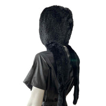 Load image into Gallery viewer, Mannequin wearing a black leather outfit with a fur-lined hood on a white background