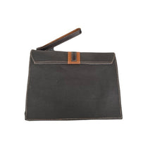 Load image into Gallery viewer, Black leather clutch bag with brown accents on a white background