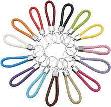 Load image into Gallery viewer, A collection of colorful leather key holders with metal rings, displayed in a circular arrangement.