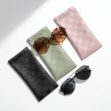 Load image into Gallery viewer, Vilniaus Kailiai eyewear case in black with soft interior, designed to protect glasses and sunglasses.