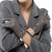 Load image into Gallery viewer, Vilniaus Kailiai gloves in black, made of soft leather, shown with detailed stitching and a snug fit for stylish warmth.