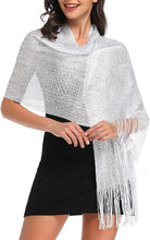 Load image into Gallery viewer, A woman smiling, wearing a long and wide shiny polyester shawl in white and gray, draped over her shoulders.