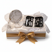 Load image into Gallery viewer, Leather coasters from Vilniaus Kailiai, model DR1085 Rinkinis, showing four round dark leather drink coasters on a wooden surface.