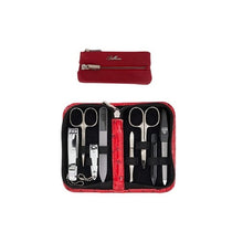 Load image into Gallery viewer, A nail care kit by RINKYS, consisting of professional manicure and pedicure tools, is displayed with a small red genuine leather purse-key holder. The tools are visible in an open case with compartments for storing nail care essentials.
