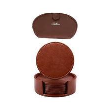 Load image into Gallery viewer, A brown leather cosmetic bag with a zip compartment and a set of six brown leather coasters with a holder