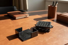 Load image into Gallery viewer, Black crocodile-patterned desk organizers on a brown leather desk with a notebook and pen holder in the background.