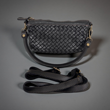 Load image into Gallery viewer, Black woven handbag with a detachable strap on a gray background