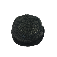 Load image into Gallery viewer, A round fur cap made of leather and astrakhan fur, with a solid black colour and a textured surface.