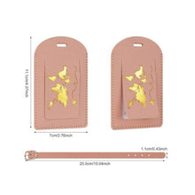 Load image into Gallery viewer, Two pink luggage tags with gold designs and measurements on a white background