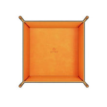 Load image into Gallery viewer, An orange PU leather storage tray with a visible stitched edge.