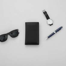 Load image into Gallery viewer, Vilniaus Kailiai Mod. W-1 wallet with multiple card slots and a sleek black leather finish, designed for style and functionality.