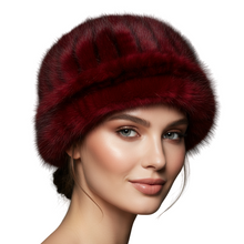 Load image into Gallery viewer, Woman wearing a red fur hat against a gray background