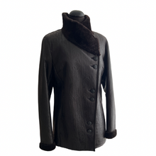 Load image into Gallery viewer, A dark brown sheepskin fur jacket with button details, notched lapels, and pockets on the front, displayed on a mannequin.