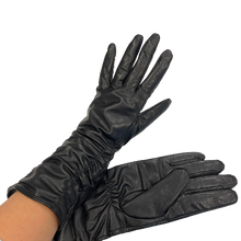 Load image into Gallery viewer, A pair of long black leather gloves for women.