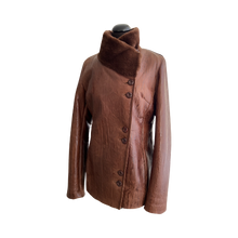 Load image into Gallery viewer, Camel brown color short Toscana sheepskin fur jacket with Nappa golden effect, buttons opening, top with notched lapels, and pockets at the front.