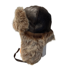 Įkelti nuotrauką į galerijos peržiūros programą, A brown Nappa sheep fur trapper hat with strings fastening on a white background.