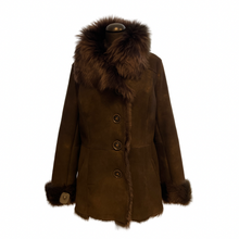 Load image into Gallery viewer, A brown sheepskin leather jacket with a wide collar and long sleeves, featuring a fur lining at the cuffs.