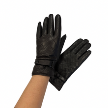 Load image into Gallery viewer, A pair of black leather gloves with a quilted design, designed for women. The gloves are displayed against a white background.