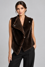 Load image into Gallery viewer, A dark brown faux fur vest displayed on a black mannequin torso against a light gray studio background.