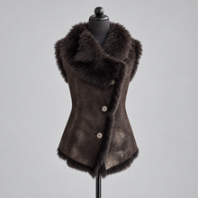 Load image into Gallery viewer, A dark brown faux fur and suede vest with a large shawl collar and three front buttons, displayed on a black mannequin torso against a light gray background.