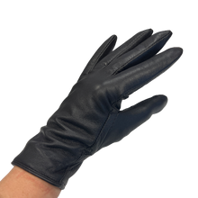 Load image into Gallery viewer, A single black leather glove on a human hand, designed for women.