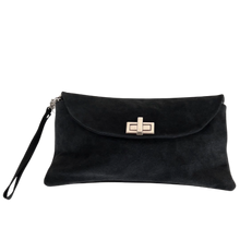 Load image into Gallery viewer, A black suede handbag with a metal clasp closure and a decorative metal ring on the front. It has a detachable shoulder strap and is shown against a white background.