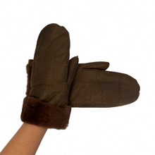 Load image into Gallery viewer, A single brown fur-lined glove with a visible leather-wrapped wrist, against a white background.