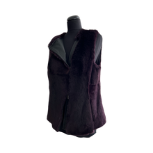Load image into Gallery viewer, A dark violet color sheared rabbit fur vest on a mannequin, featuring a front slanting and two-way going zip fastening.