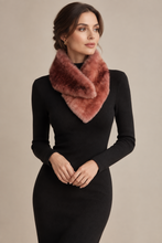 Įkelti nuotrauką į galerijos peržiūros programą, A woman wearing a black long-sleeve knit dress and a dusty rose faux fur cowl neck warmer, posed against a solid beige studio background.