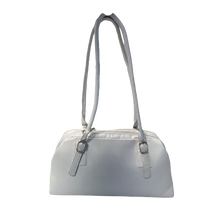 Load image into Gallery viewer, A white leather handbag with a handle and zipper closure, displayed against a plain background.