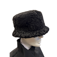Load image into Gallery viewer, A black astrakhan fur hat displayed on a mannequin head.