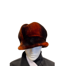 Load image into Gallery viewer, Brown and black sheepskin fur hat on a mannequin head against a white background