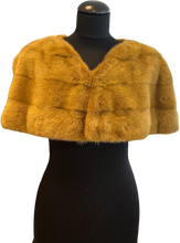 Load image into Gallery viewer, A brown mink bolero jacket with colourful lining and fur hook fastening at the front on a mannequin.