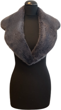 Load image into Gallery viewer, Gray knitted scarf on a black mannequin against a white background