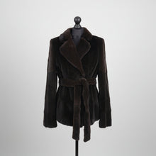 Įkelti nuotrauką į galerijos peržiūros programą, A mahogany dark brown sheared mink jacket with a tie, fur hook fastening, and pockets at the front, displayed on a mannequin.