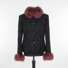 Įkelti nuotrauką į galerijos peržiūros programą, A black short jacket with red-dyed silver fox collar, leather bottons and sleeve trims on a mannequin.