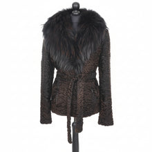 Įkelti nuotrauką į galerijos peržiūros programą, A chocolate brown dyed astrakhan (karakul) hip-length jacket with a dyed brown raccoon collar, displayed on a mannequin.