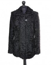 Load image into Gallery viewer, Black astrakhan fur jacket bellow hip length, pockets at sides.