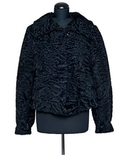 Load image into Gallery viewer, Black textured jacket on a mannequin against a white background