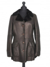 Load image into Gallery viewer, A dark brown leather jacket with black sheepskin fur collar and cuffs, featuring a V-neck, notched lapels, and front pockets.