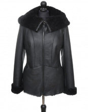 Load image into Gallery viewer, Black faux fur hooded short coat with zipper opening and pockets at the front, adjustable sleeve length, on a mannequin.