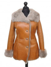 Load image into Gallery viewer, Brown/Orange long Nappa Toscana sheepskin jacket with buttons opening, wide collar and pockets at the front, displayed on a mannequin.