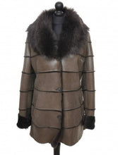 Load image into Gallery viewer, A khaki brown sheepskin fur long coat with a shawl collar and front pockets, displayed on a mannequin.