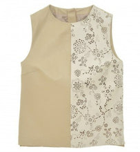 Load image into Gallery viewer, Beige and white sleeveless leather blouse with round neckline and laser perforated leather in front, lining, displayed on a white background.
