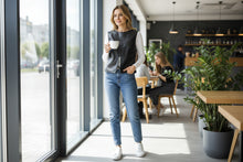 Load image into Gallery viewer, Black sheep leather sleeveless blouse-top with decorative zip at the front displayed on a mannequin.
