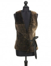 Load image into Gallery viewer, A dark brown sheepskin fur vest with goldening tipping, displayed on a mannequin.